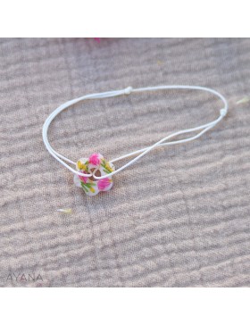 Bracelet en résine avec fleurs oranges et fuschia