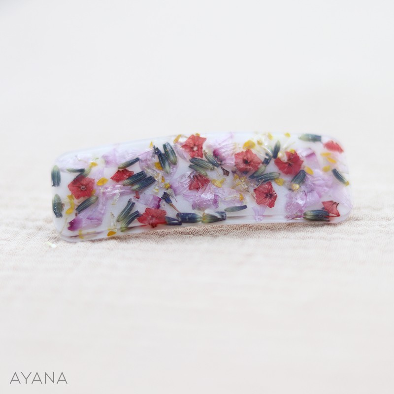 Barrette en resine fleur sechee CAMERON Barrette en resine fleur sechee CAMERON